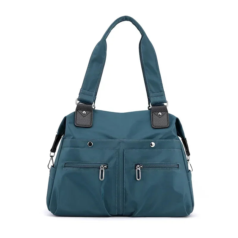 Large capacity commuter shoulder canvas bag