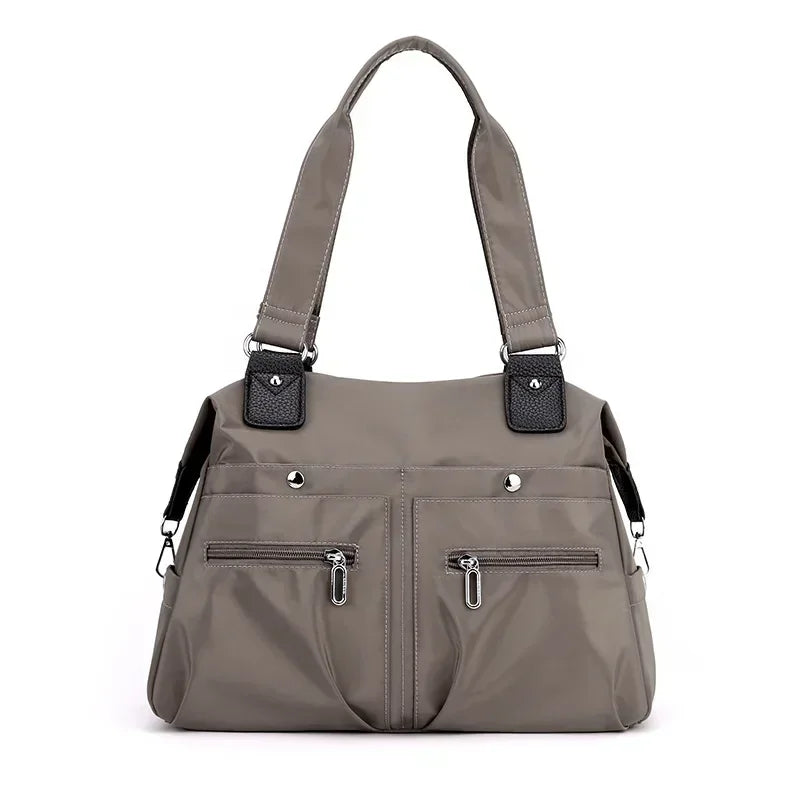 Large capacity commuter shoulder canvas bag