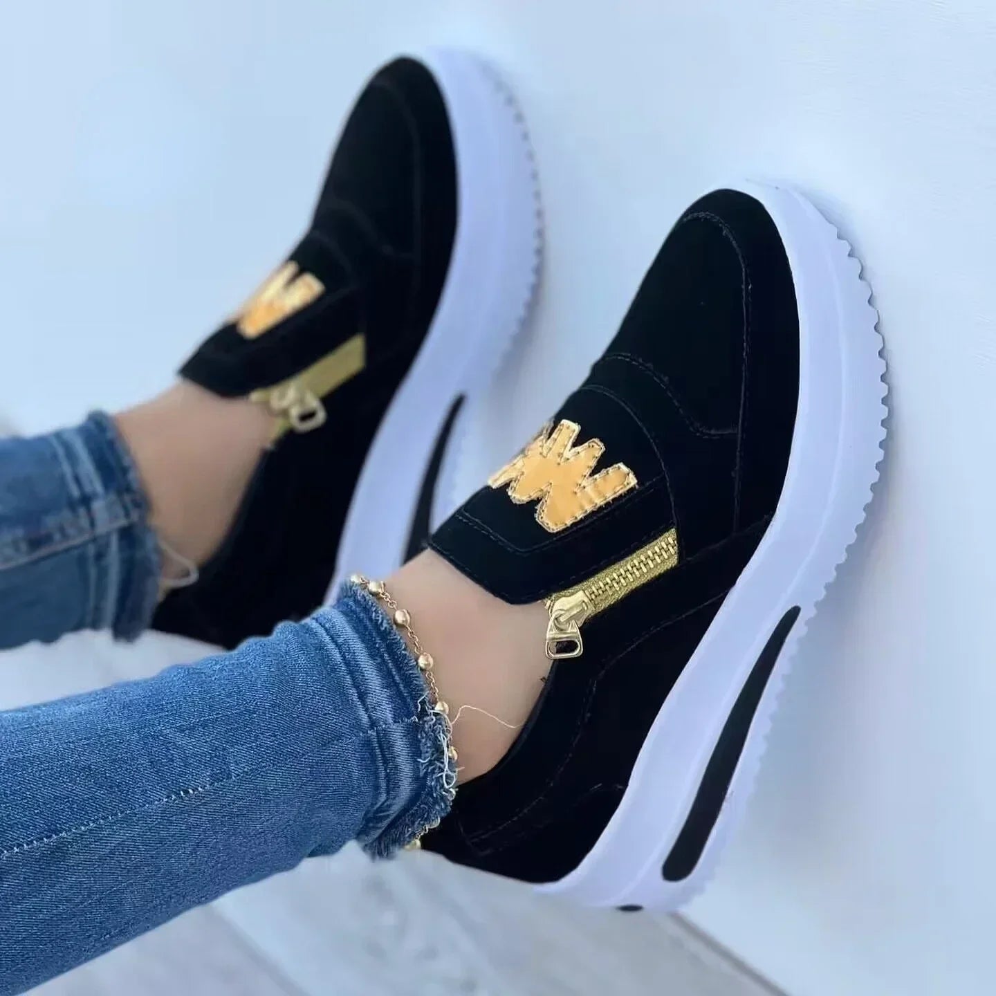 Casual sneakers with flat soles and side zippers