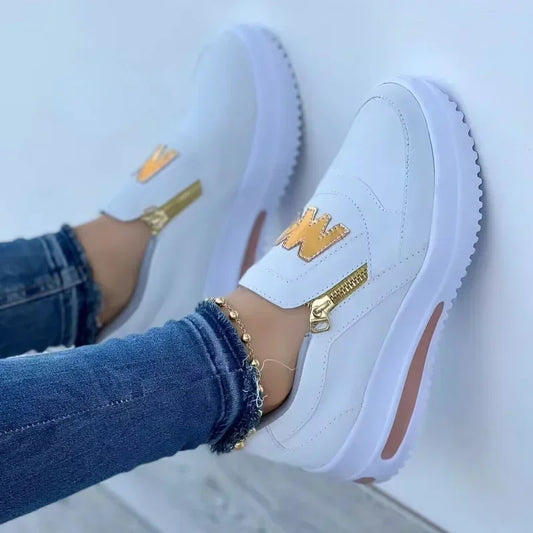 Casual sneakers with flat soles and side zippers